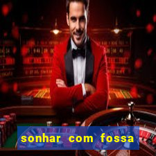 sonhar com fossa de fezes cheia